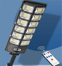 Cargar imagen en el visor de la galería, Lámpara Solar Exterior con Sensor de Movimiento – Luz LED Impermeable para Jardín y Patio
