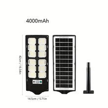 Cargar imagen en el visor de la galería, Lámpara LED Solar Exterior 600W con Sensor de Movimiento y Control Remoto – Foco Potente para Jardín, Patio y Garaje
